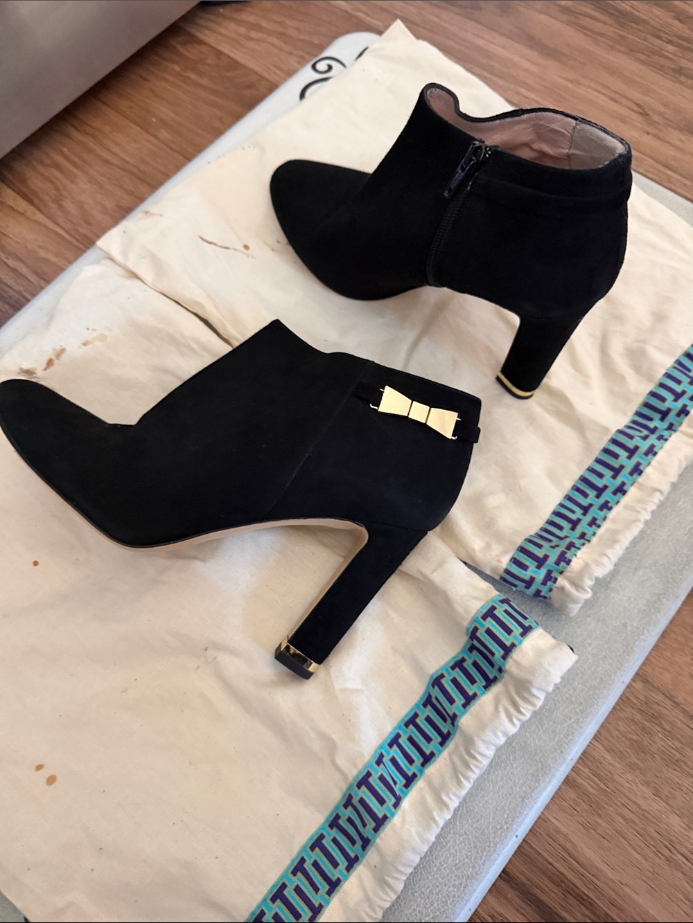 kate spade Black Suede Ankle Booties with Gold Bow Accent